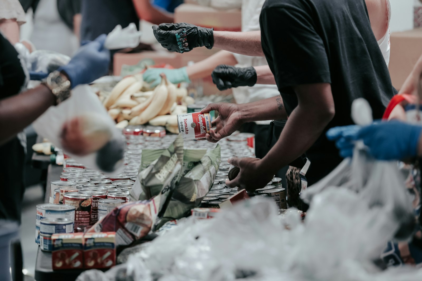 Volunteers packing and distributing donations