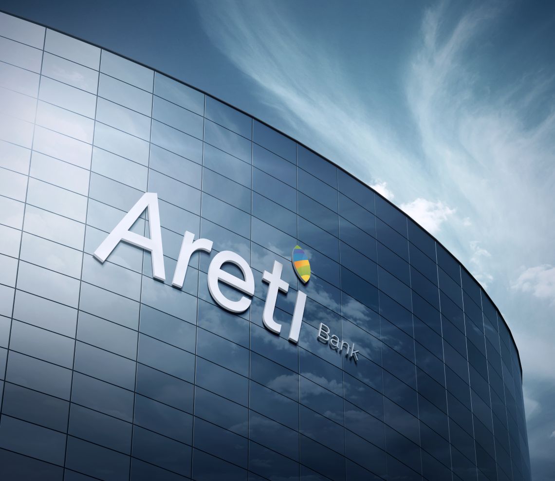 Areti Bank signage on a glass facade