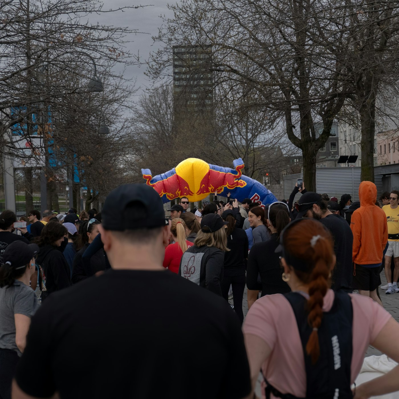 Giant inflatable over a crowded street event